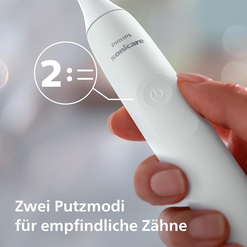 Sonicare 4100 – Sonicare Elektrische Zahnbürste für Erwachsene mit 1 x Philips W2 Optimal White Sonic Bürstenkopf in Weiß, schlankem Reiseetui und USB-Ladegerät (Modell HX3683/33)