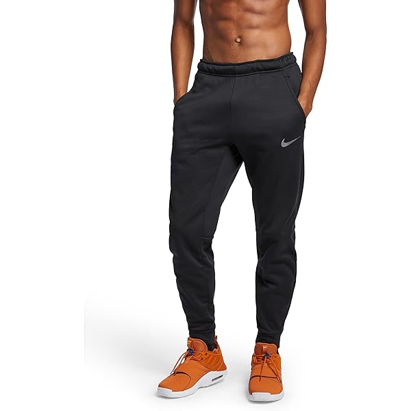 nike training tall therma tapered joggers in black