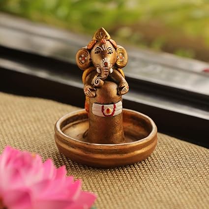 ExclusiveLane Terracotta Handpainted Copper Finish Baby Decorative Ganesha Holding Lord Shiva in Pound -Idols and Figurines Showpieces Home Decor