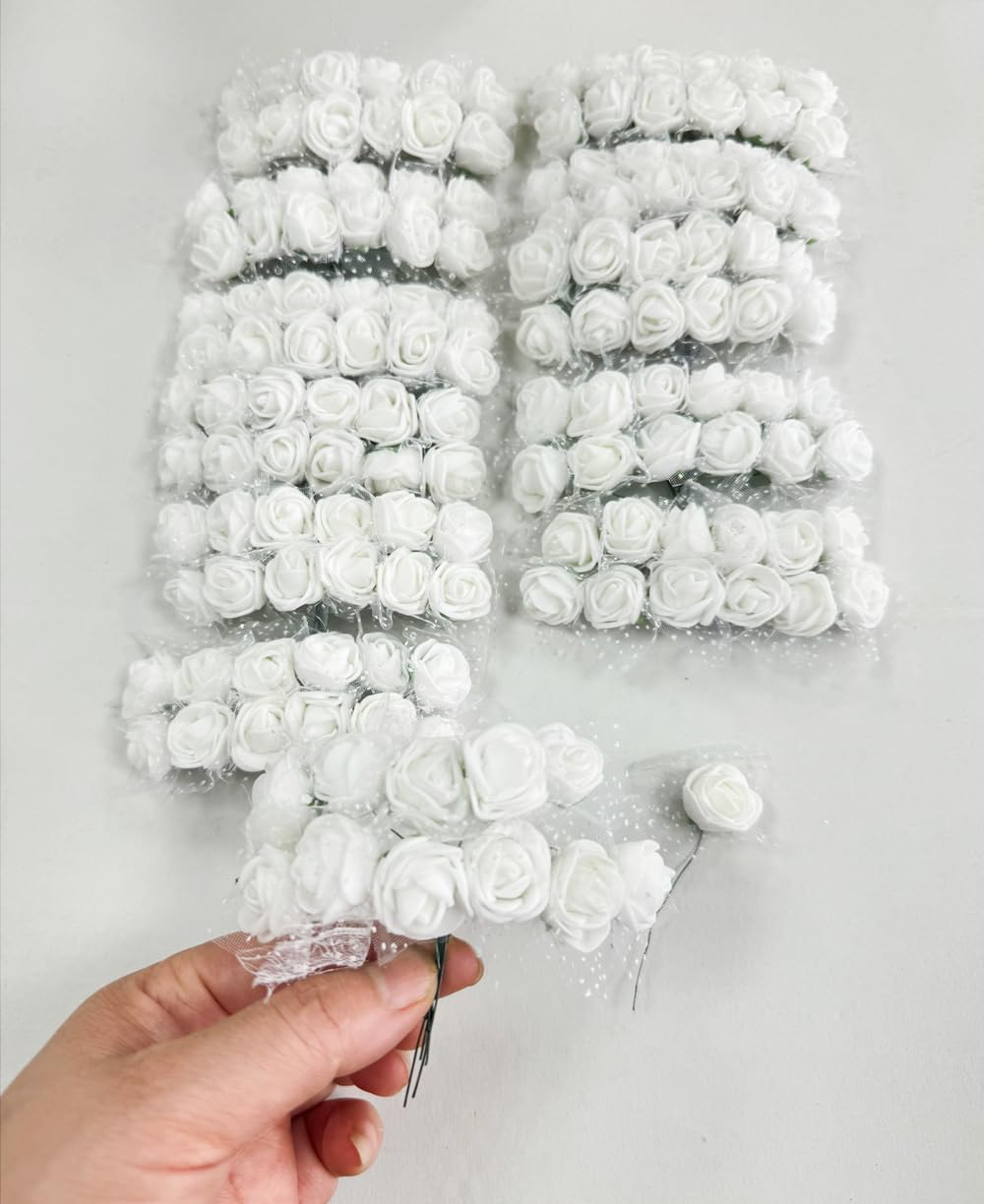 Photo 1 of 144pcs Mini Artificial Rose Flower Heads and Soft Stem,25mm PE Tiny Rose add Gauze for DIY Wedding Make Bridal Hair Clips,Cake Top,Wrist Corsage Boutonniere,Wreath Bracelet Flower (White)