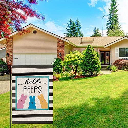 Double-sided burlap backyard flag with decorative design.