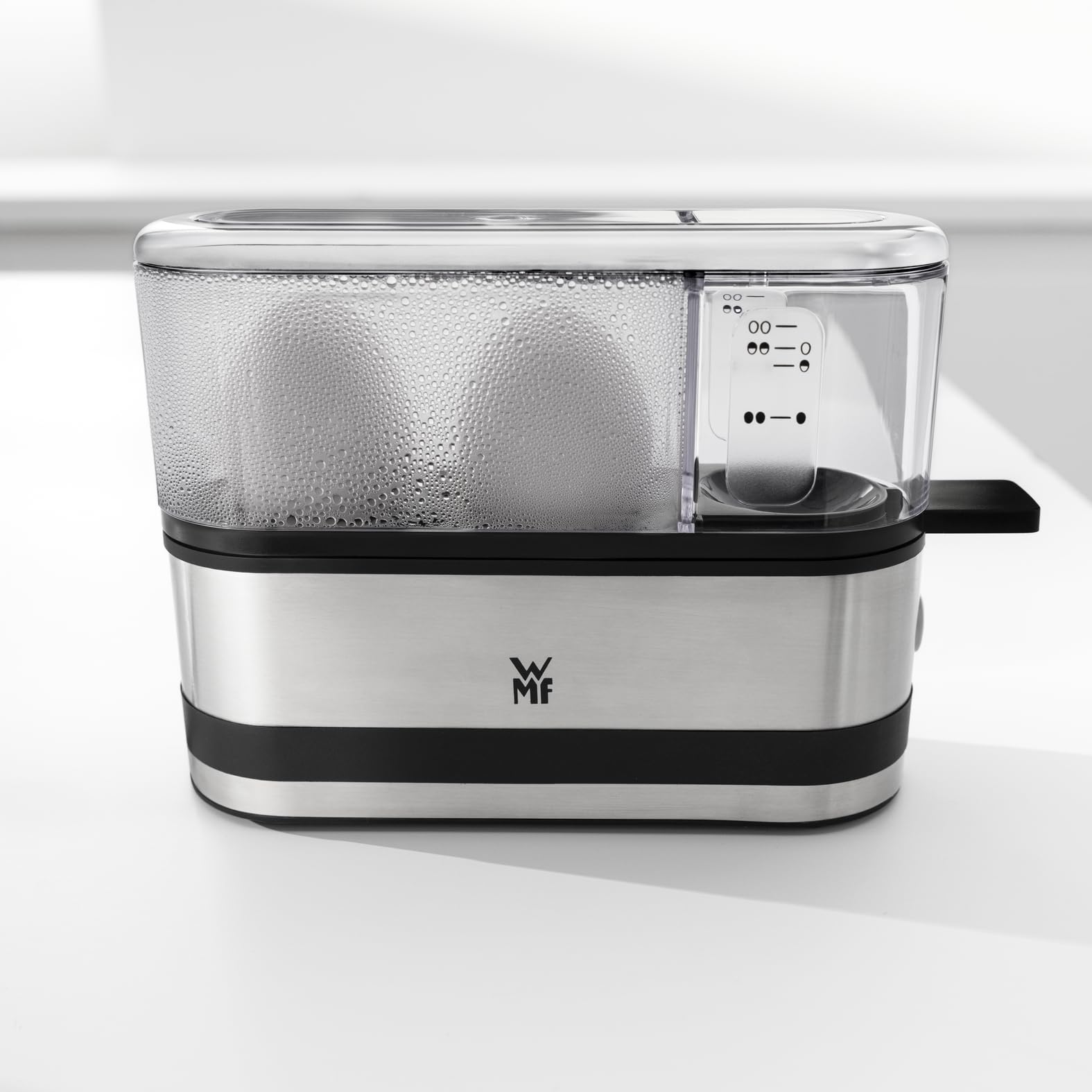 WMF Küchenminis Eierkocher aus Cromargan, kocht 1–2 Eier optimal weich, mittel oder hart, einfache Einstellung für optimal Ergebnisse, 250 W, Messbecher, Eipick, platzsparendes Design 3