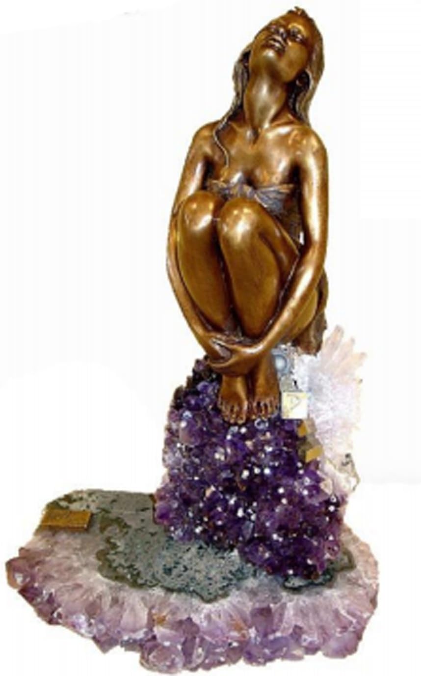 Beautiful Blonde Sexy Lady Sitting on semi Precious Stones.