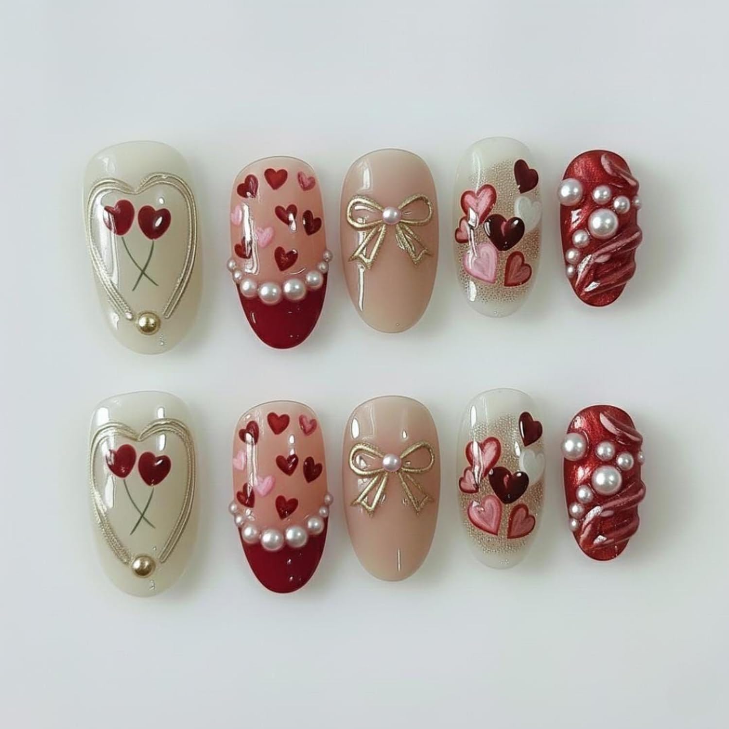 Photo 1 of 30Pcs Cute Valentine's Press on Nails,Red Heart and Pearls Fake Nail Short Almond French Tip Press On Glitter Gold Bow Stick on Nails Handmade Nail Art,Pink Love Nail Tip Romantic Valentine for Women