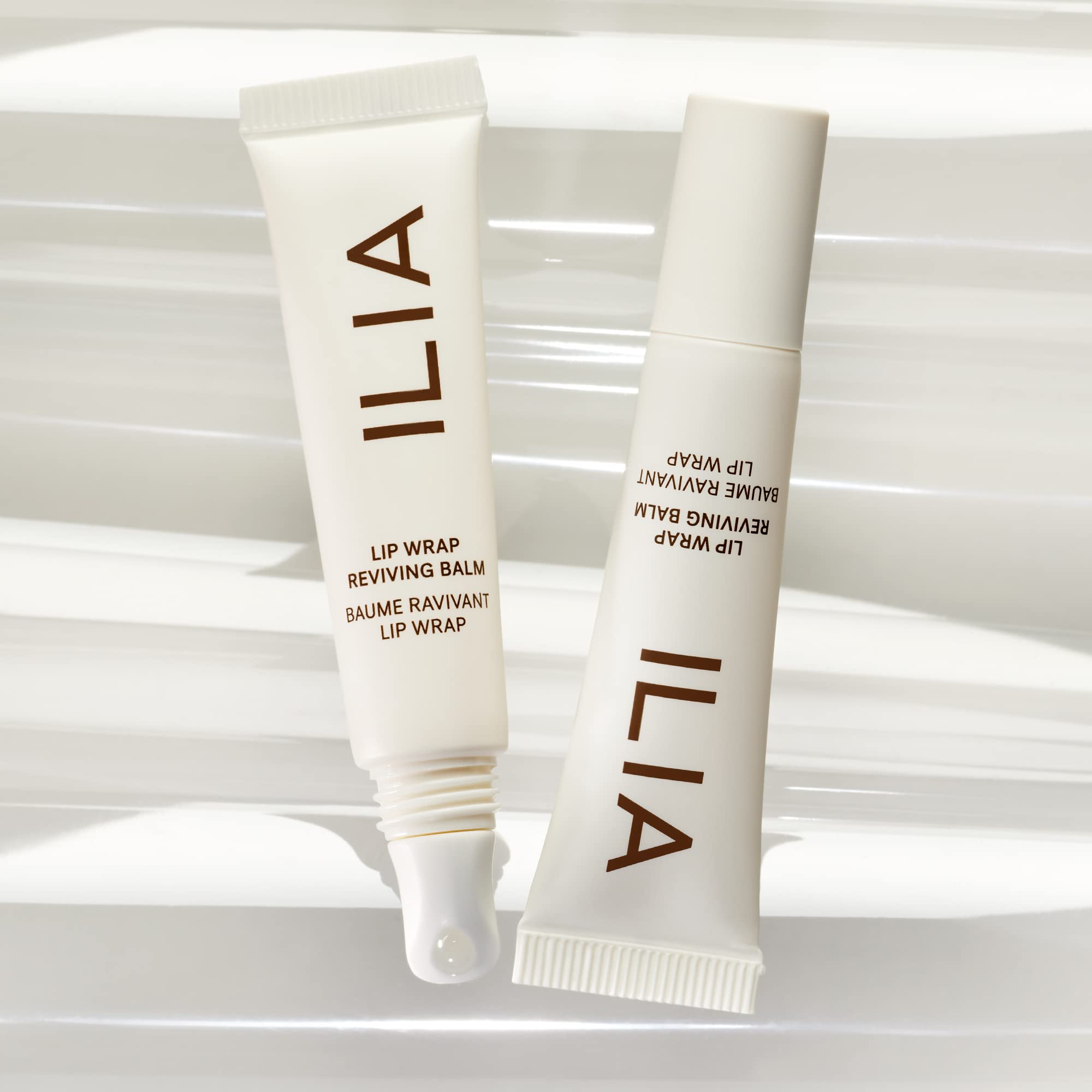 ILIA - Lip Wrap Reviving Balm | Hydtrate, Smooth, Plump | Barrier-Building with Hyaluronic Acid + Sea Succulent | Gluten + Silicone-Free | Non-Toxic, Vegan, Cruelty-Free (Lucid, 0.23 fl oz | 7 ml)