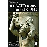 The Body Bears the Burden: Trauma, Dissociation, and Disease