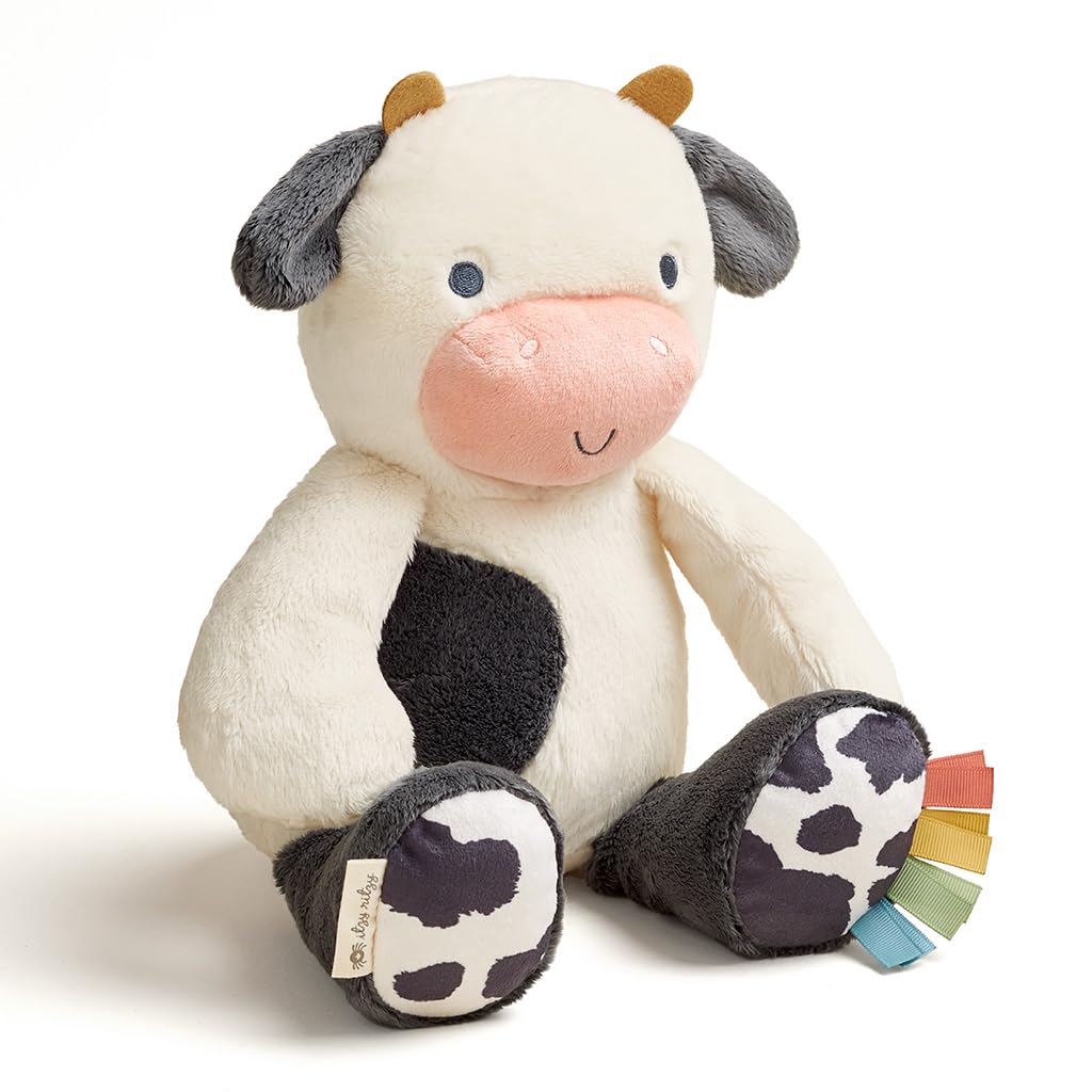 Itzy Ritzy Snuggles Plush Toy – Soft Stuffed Animal for Babies, Kids & Adults – Sensory Ribbons & Textured Fabrics for Tactile Play – Cozy & Cuddly Companion for Newborns & Up (Cow)