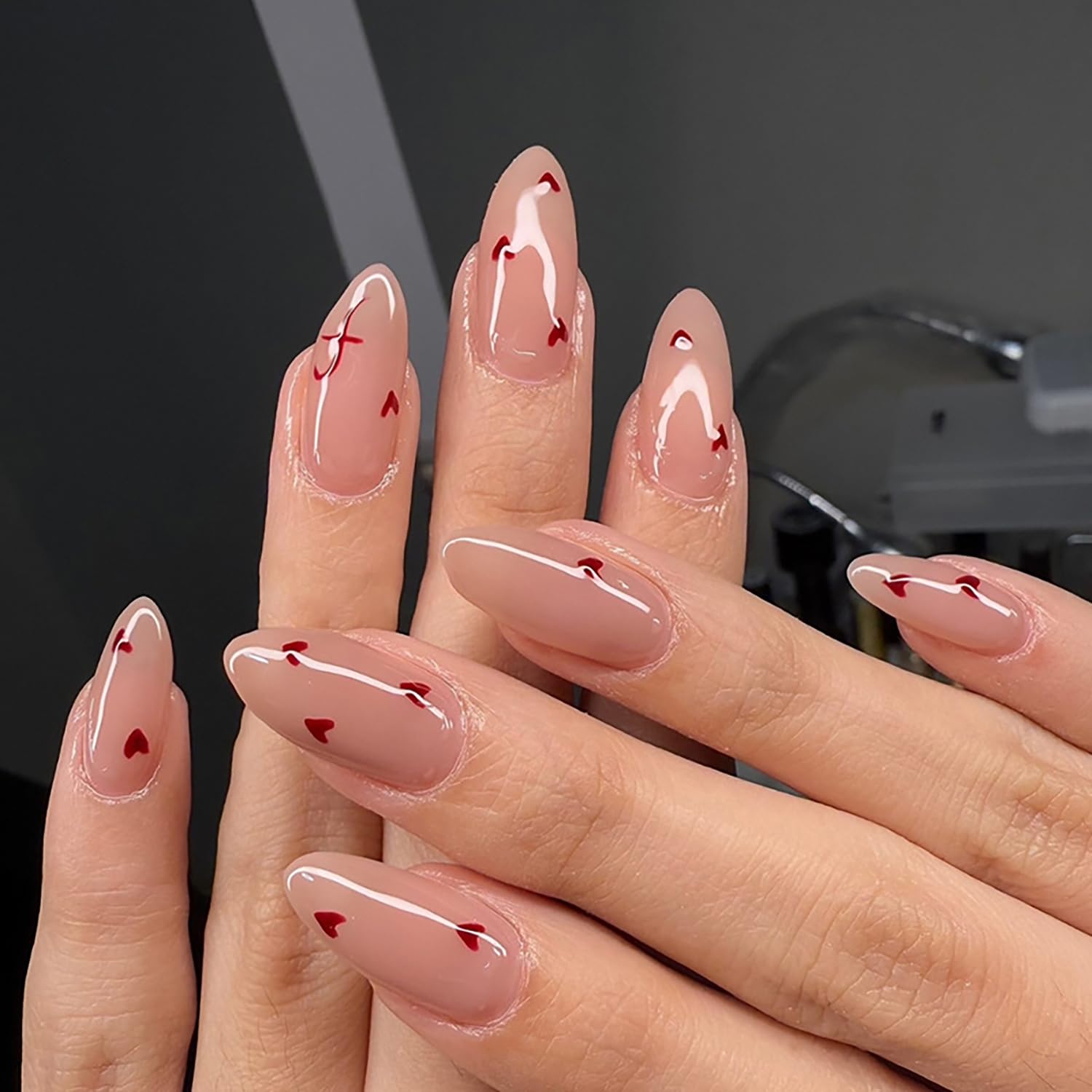 Photo 1 of 24Pcs Heart Press on Nails Medium Almond Fake Nails Valentines Glue on Nails Nude Pink Full Cover False Nails Red Love Hearts Artificial Acrylic Nails Stiletto Stick on Nails for Valentines Nails