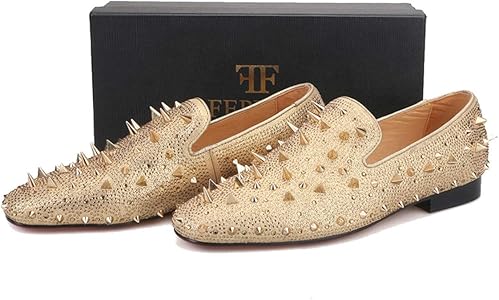 white and gold loafers with spikes