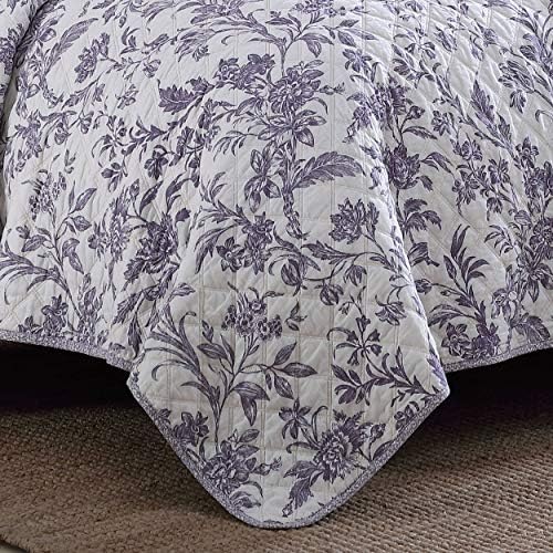 Cotton quilt set with shams in various shades of blue and white.