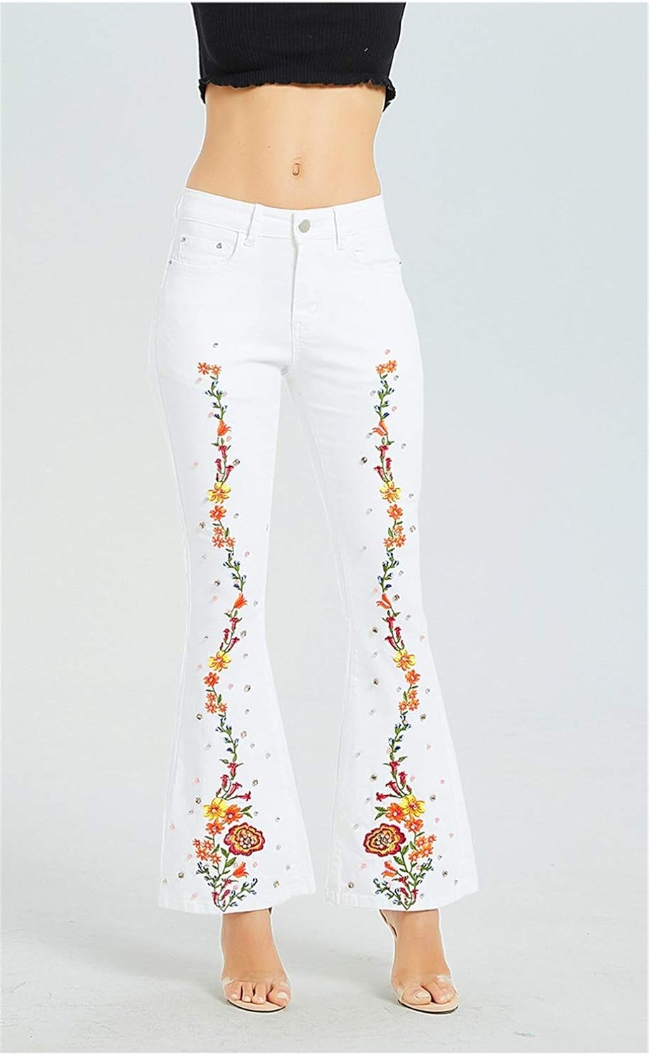 white jeans with embroidery on legs