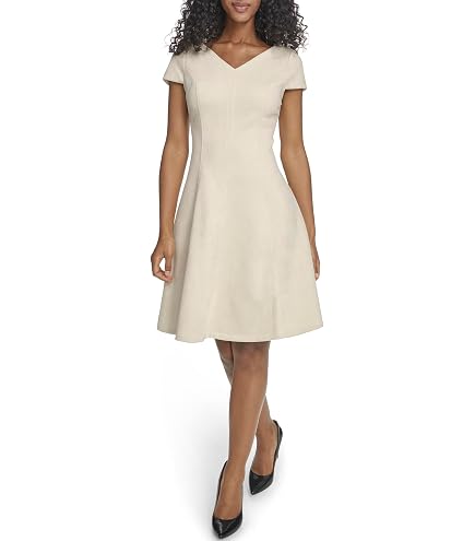 Calvin Klein Women's Short Sleeve Round Neck Belted Melangue Suiting Bubble Hem A-line Dress, Indigo, 2 at Amazon Women's Clothing store