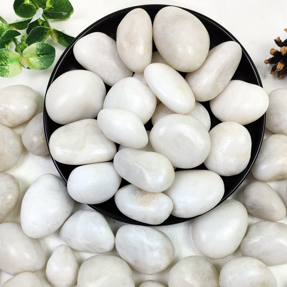 Photo 1 of YISZM 5lbs White River Rocks, 1-2 Inch Natural Pebbles for Indoor Plants, High Polished Decorative Stones Vase Filler Fish Tank Aquariums Landscaping Garden Outdoor and Indoor DIY