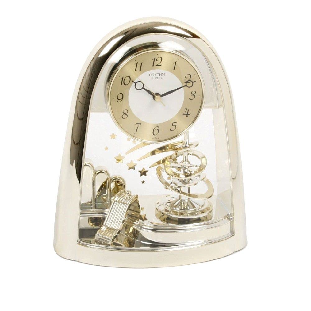 Rhythm Gold Rotating Pendulum Space Mantel Clock
