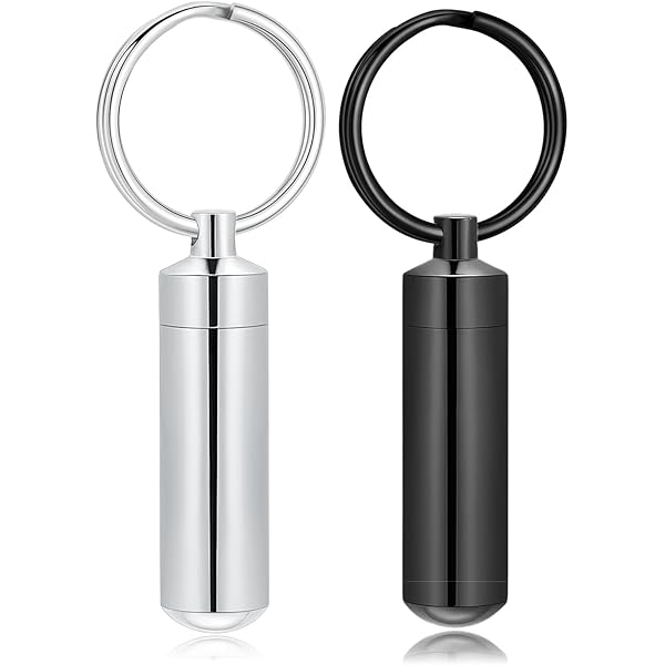 Vente Pendentif acier en forme de menotte avec clé Vente Pendentif acier en forme de menotte avec clé