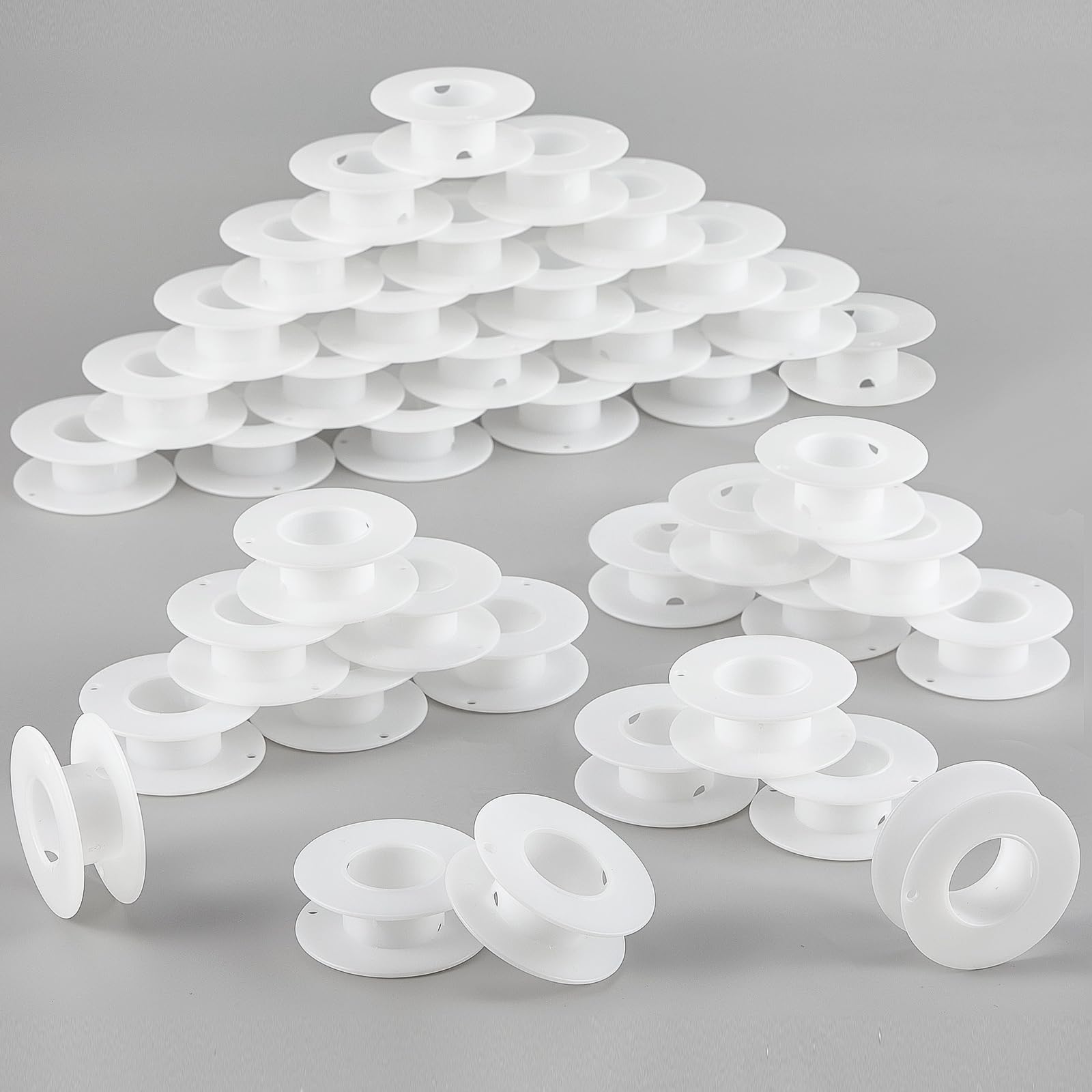 Photo 1 of Weysat 40 Pack Empty Plastic Spools for Storing Chains and Ribbons White Wire Weaving Bobbins Thread Spools Ribbon Chain Tape Spools for Embroidery Thread Yarn Ribbon Crafts Sewing 2.2x0.79 Inch