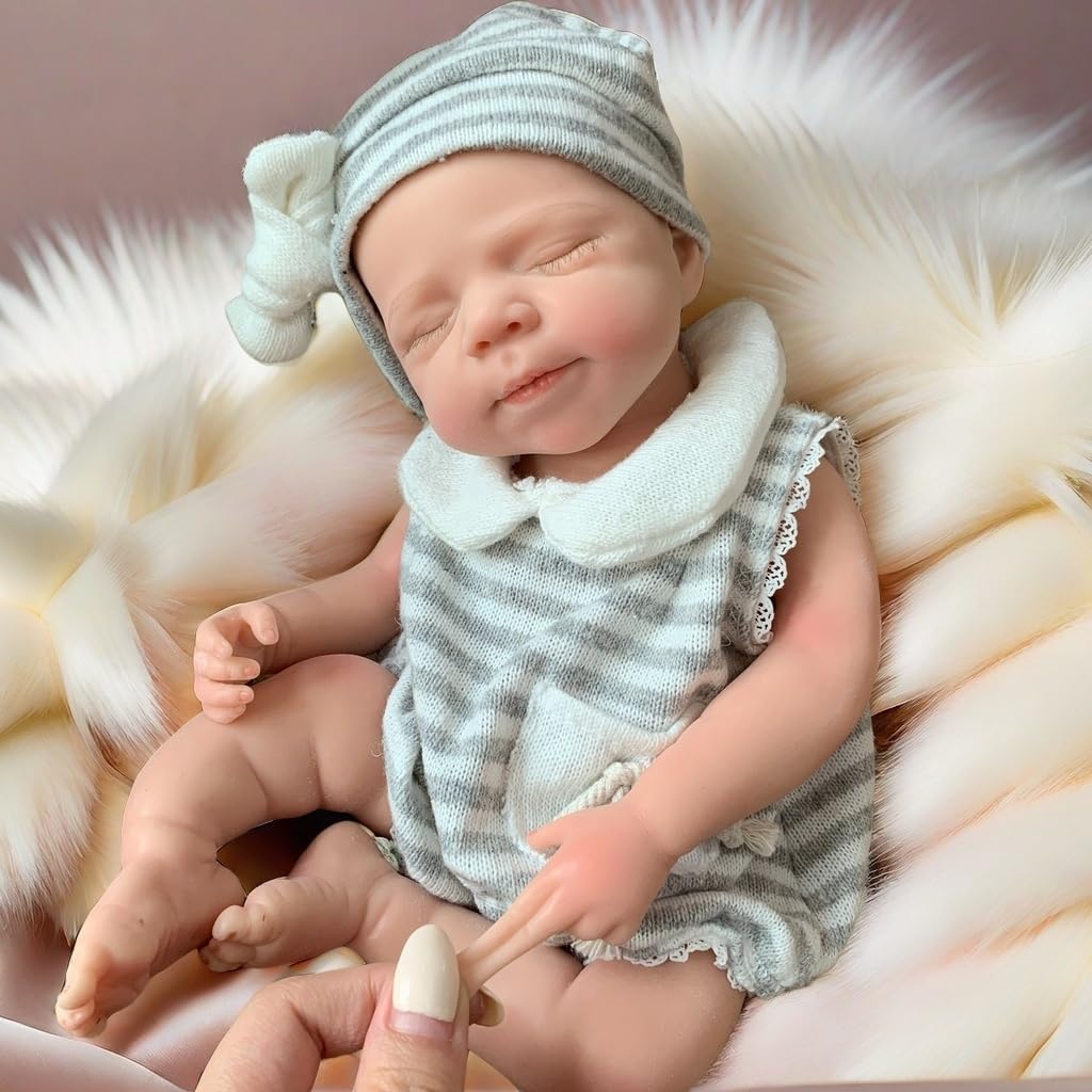 Photo 1 of Yokyyi 13Inch Pascale Reborn Baby Dolls Silicone Full Body Correct Real Close Eyes Full Body Silicone Baby Dolls Sleeping Girl with Feeding Kit