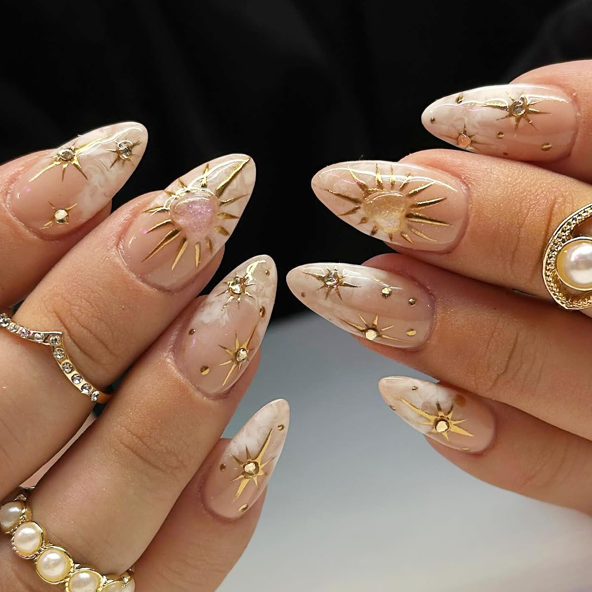 Photo 1 of Medium Press on Nails Almond Fake Nails 3D Gold Star Rhinestones Design Acrylic Nails Stiletto Glue on Nails Artificial Nails Glossy Nude Stick on Nails Full Cover False Nails for Women Girls 24Pcs