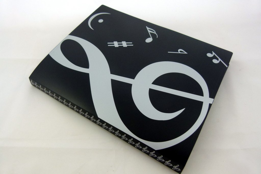 Music Themed 20 Pockets Plastic Folder Display Book Soft Cover - Black Cover White Treble Clef Design