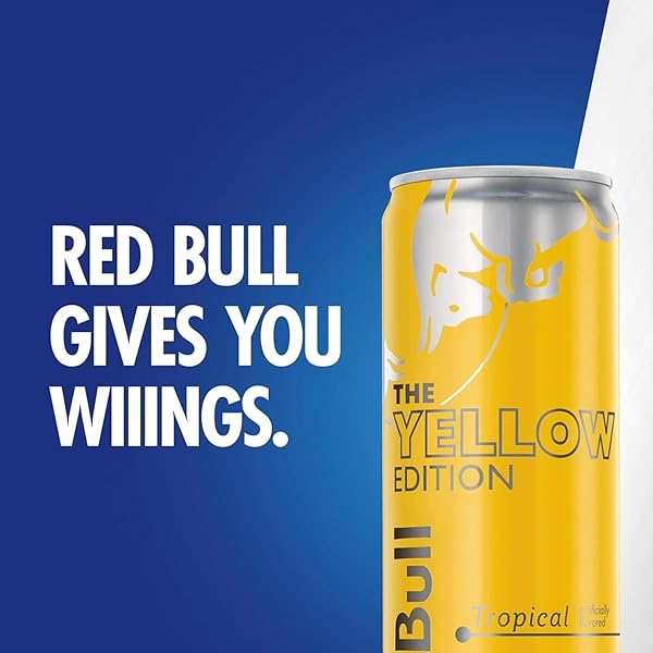 RED BULL YELLOW EDITION TROPICAL ENERGY DRINK. 12 FL OZ, 4 CANS