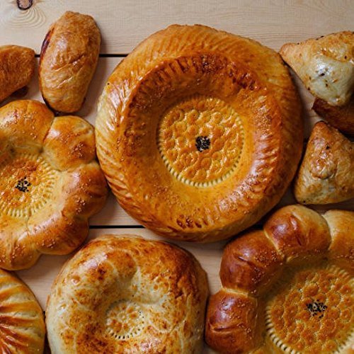 Low-priced-three-piece-set-of-traditional-handmade-Uzbekistan-bread-stamping-tools-196-inch-each-in-diameter-Free-cookbook