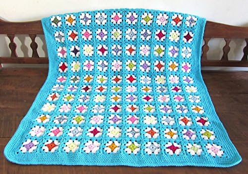 Handmade crochet granny squares throw / afghan / blanket . Dress up any room of your house. Approximately 41 inches by 52 inches