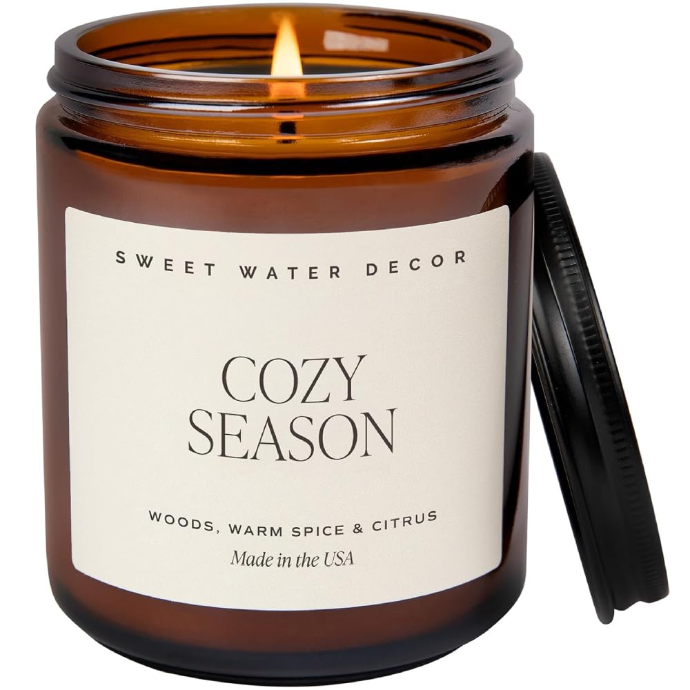 Photo 1 of Sweet Water Decor Cozy Season Soy Candles - Fall Candles with Woods, Warm Spice, and Citrus Scent for Home Decor - Soy Candle with 40 Hours Burn Time - 9Oz Black Lid Amber Jar Candles Fall Scents