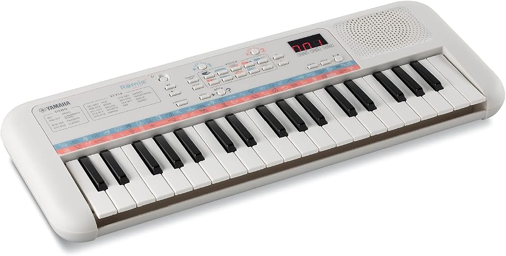 Yamaha Remie PSS-E30 Portable Mini Keyboard White 47 Voices 74 Effects
