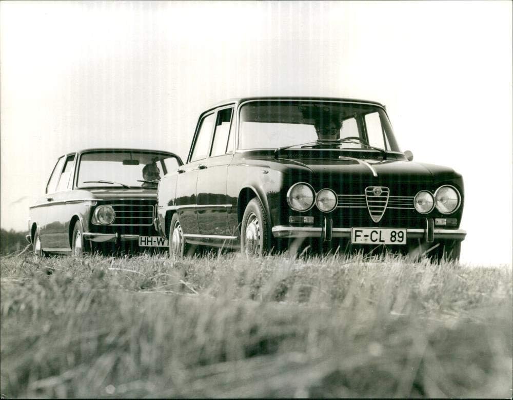 Vintage photo of 1969 Alfa Romeo Giulia 1300 TI and BMW
