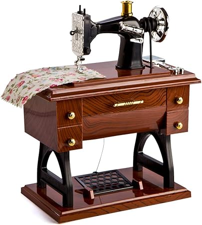 Dibujos animados máquina de coser caja de música: Amazon.es: Hogar