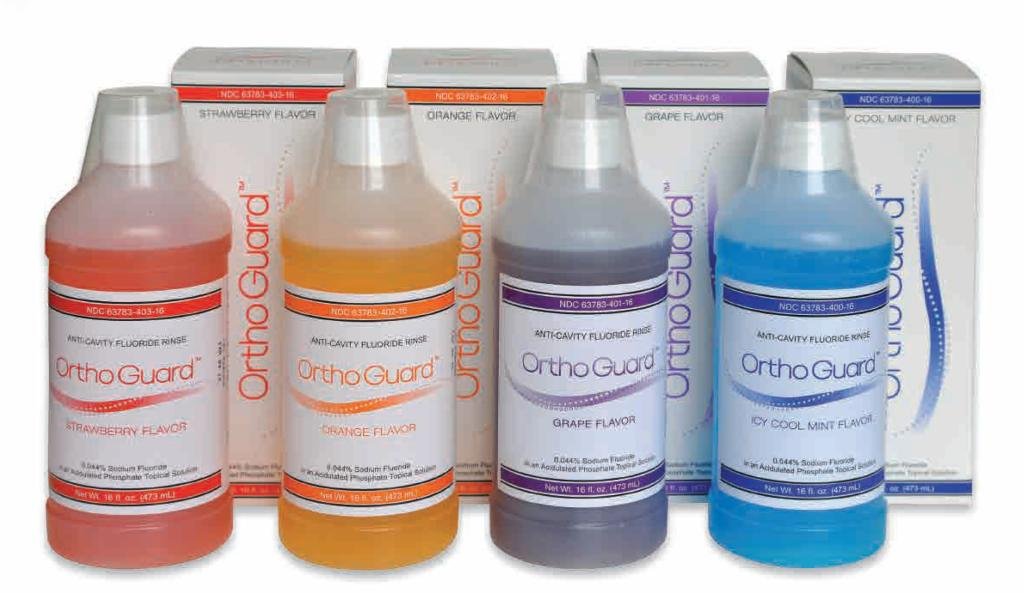 Ortho Guard strawberry flavored .044 fluoride rinse A