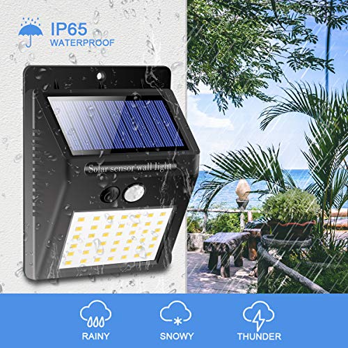 Luce Solare LED Esterno[4 Pezzi ] 42 LED IP65 Impermeabile 3 Modalità per Giardino,Parete Sensore di Movimento Parete Wireless Risparmio [Classe di efficienza energetica A+++]