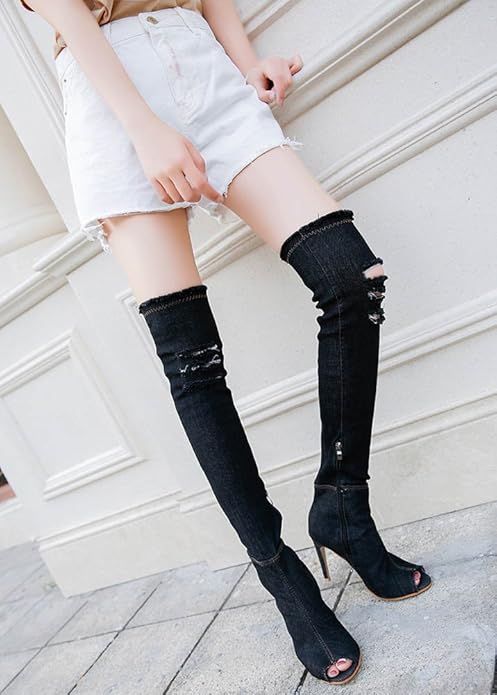 knee high boots with ripped jeans