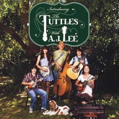 The Tuttles With Aj Lee Introducing The Tuttles Amazon Com Music