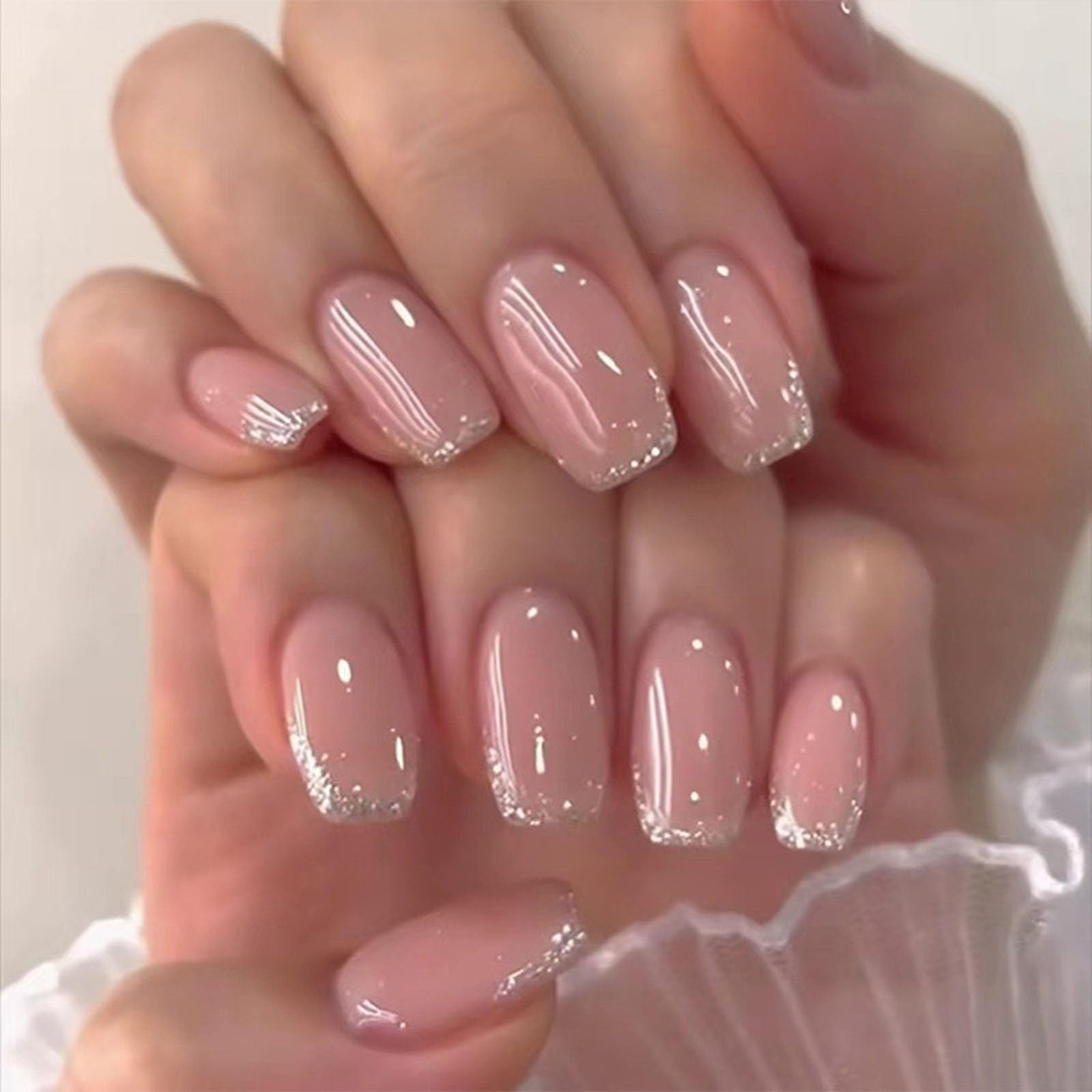 Photo 1 of Short Press on Nails Coffin Fake Nails with Glitter Designs Nude Nails Press ons Glossy Glue on Nails Daily Wear Simple French Tip Acrylic Artificial Stick on Nails for Women 24Pcs