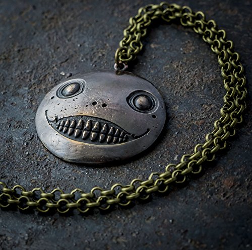 NieR Emil brass pendant