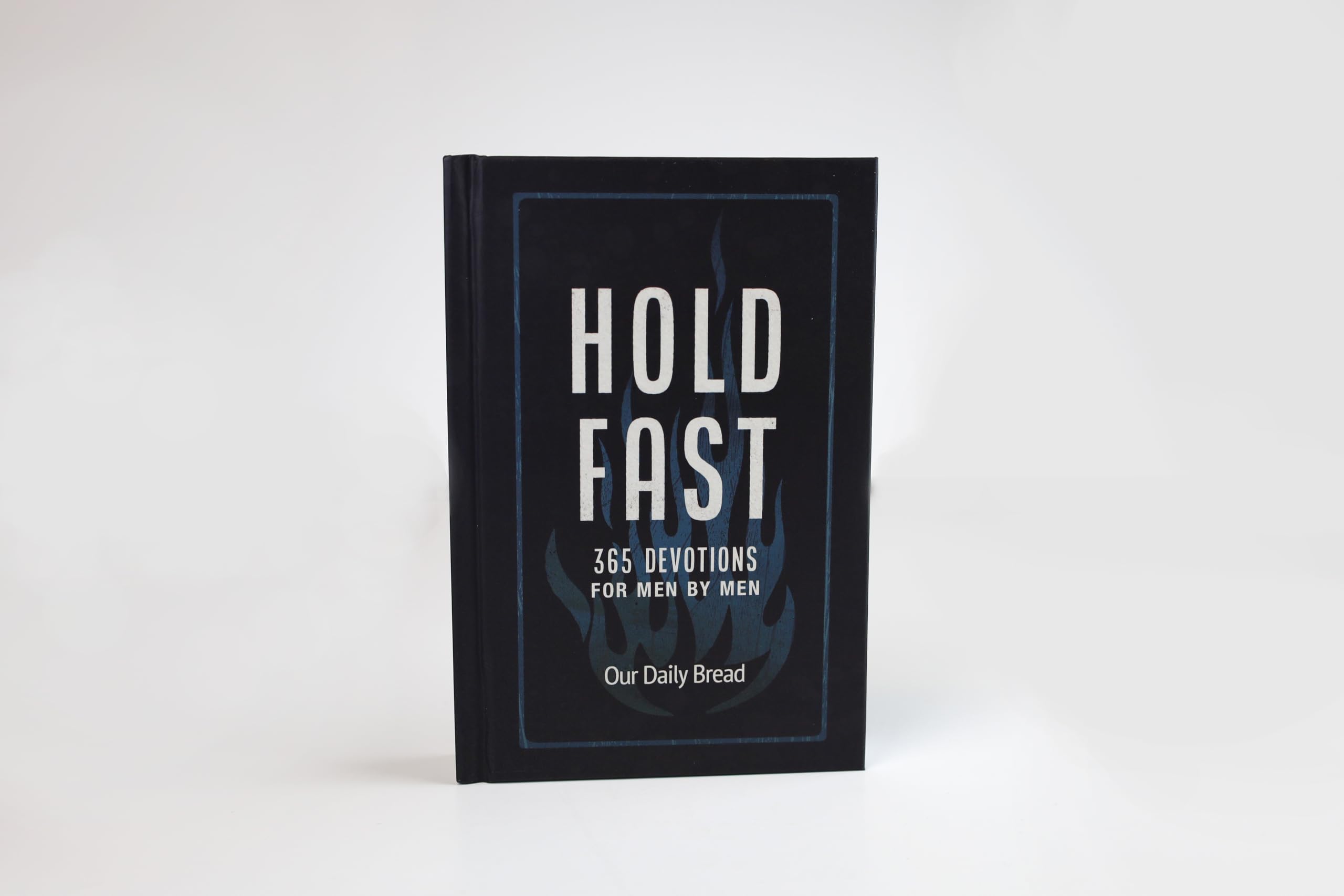 Hold Fast: 365 Devotions for Men by Men (A Daily Bible Devotional for the Entire Year) (Stand Strong)