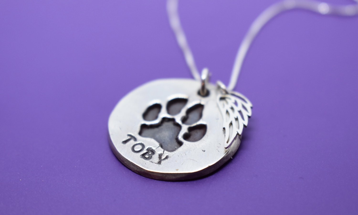 get your dog's paw print on a necklace