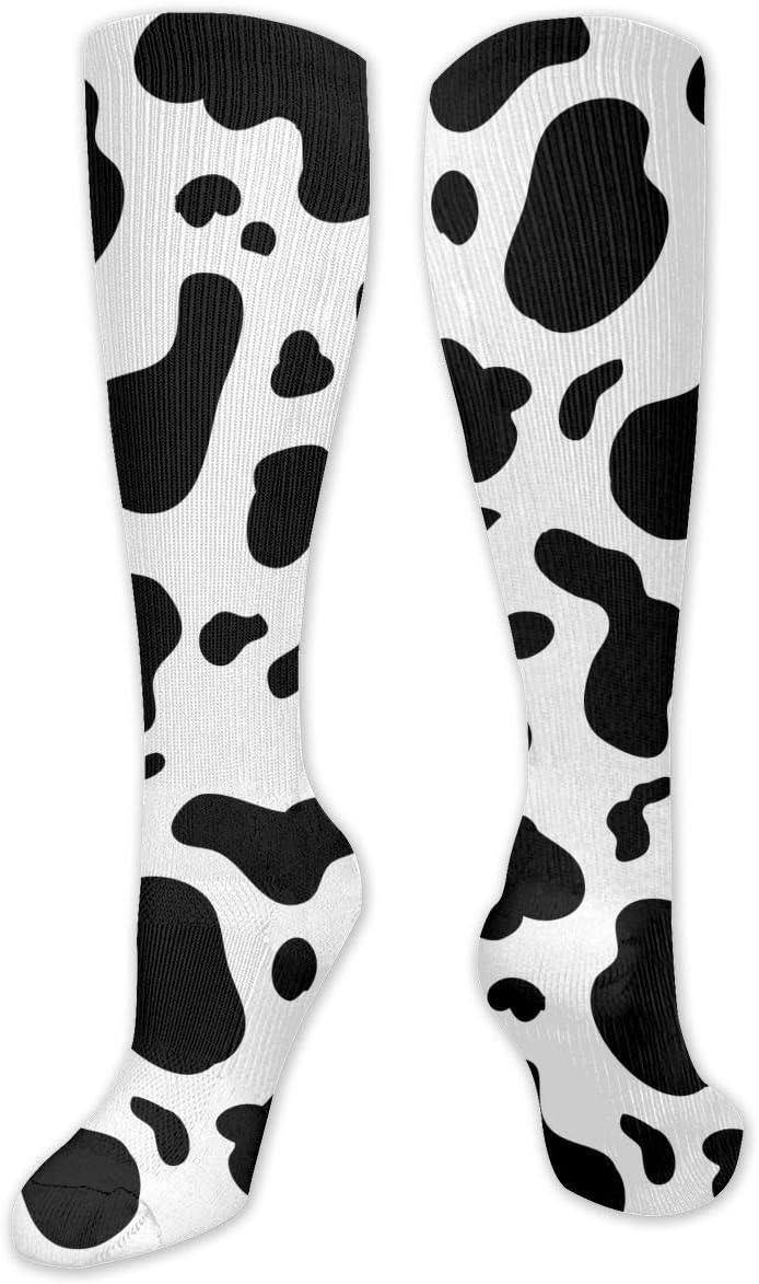 cow print thigh high boots