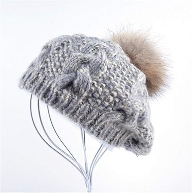 flat cap with pom pom