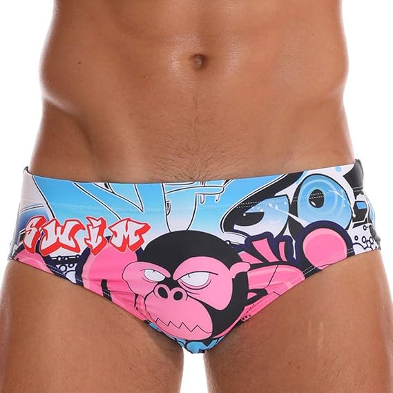 homme en string a la plage