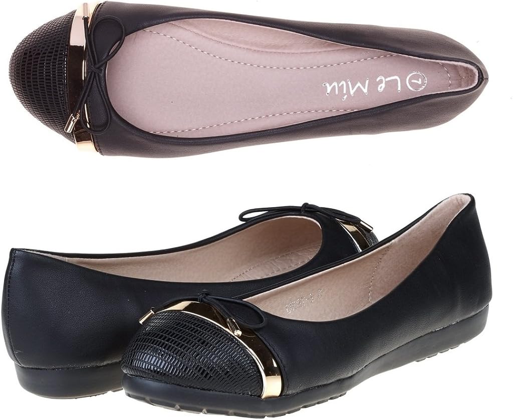 black dress shoes with gold accents