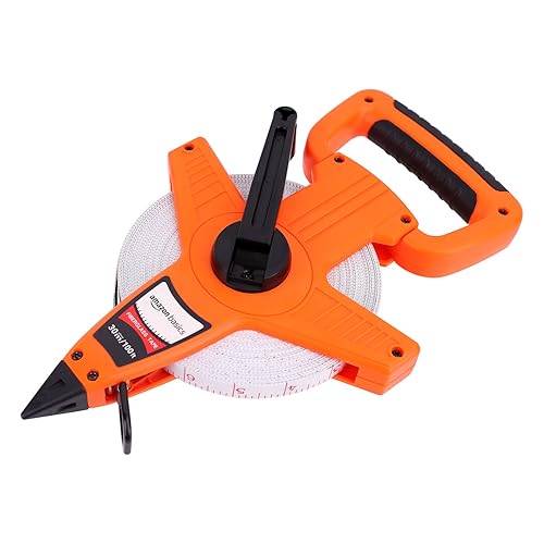 Amazon Basics Open Reel Fiberglass Measuring Tape, Inch/Metric Scale, Impact Resistant Shell, 100-feet (30-Meters) by 1/2-Inch, Orange