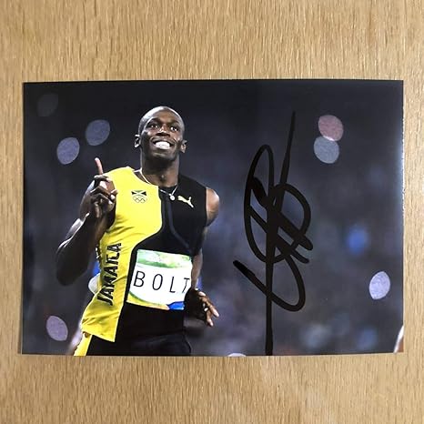 Amazon 陸上 ウサインボルト 直筆サイン入り２ｌ写真 オリンピック３連覇 人類史上最速 世界記録保持者 おもちゃ ホビー
