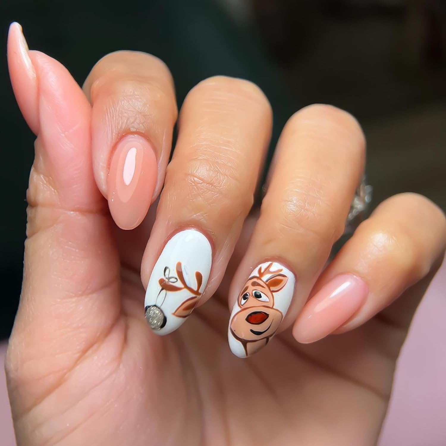 Photo 1 of 24 Pcs Christmas Fake Nails Almond Press on Nails Medium Nails Glossy Light Orange False Nails with Cute Cartoon Reindeer Pattern Designs Full Cover Christmas Press on Nails for Women and Girls