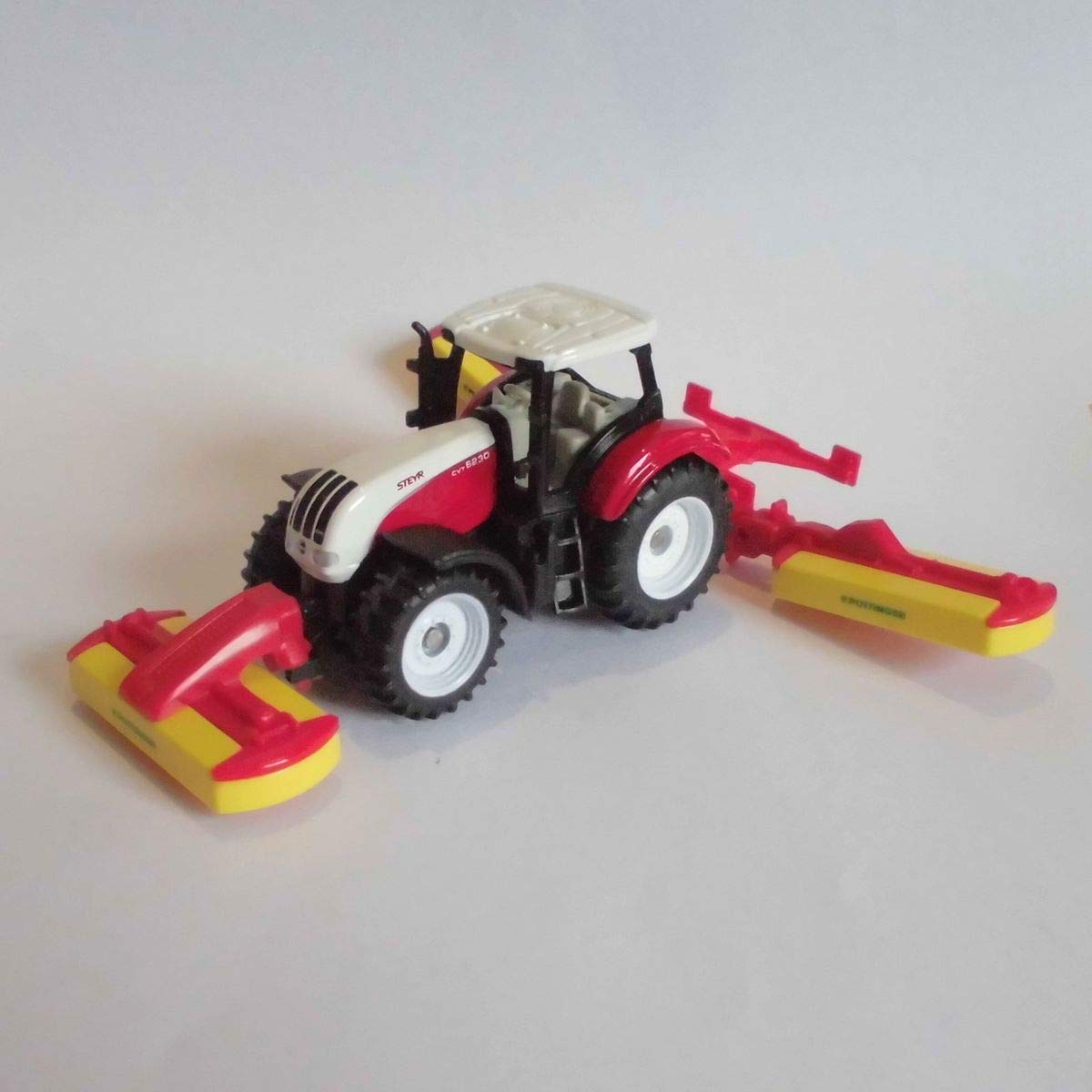 Siku - Siku 1672 Tractor Steyr With Pöttinger Mower Combination for Kids - 1 Count — image 1