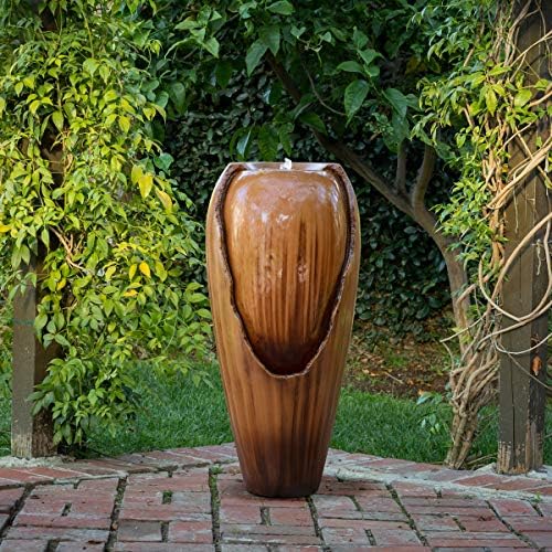 Outdoor tiered water fountain with jars cascading water down each level.