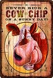 River's Edge Never Kick a Cow Chip on a Sunny Day Embossed Tin Sign, X-Large/12x17-Inch