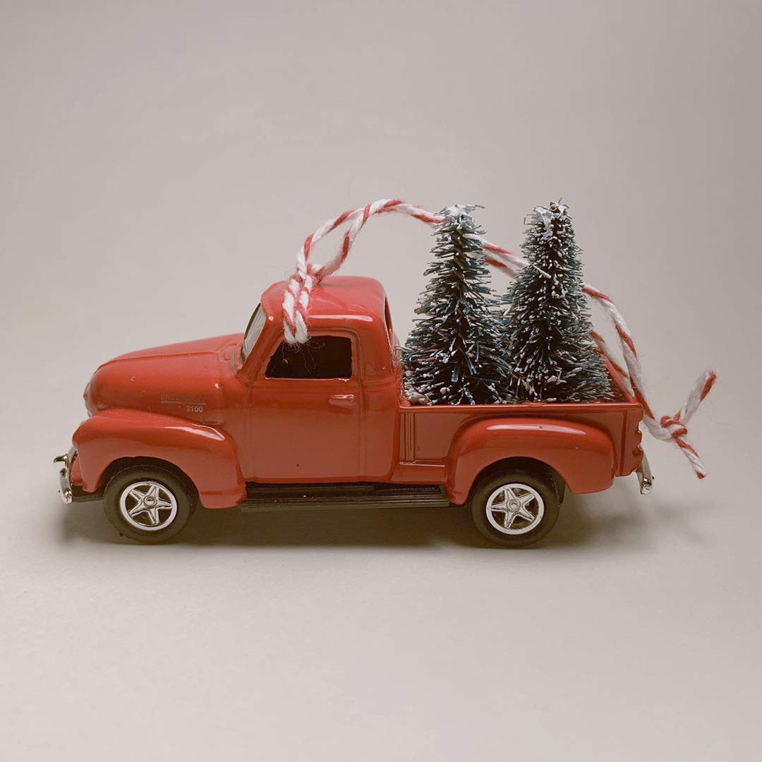 Vintage Red Chevy Pickup Truck Carrying Christmas Trees