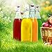 Swing Top Bottles Set of 4 Glass Kombucha Fruit Beverage Beer Liquor 32 Ounces Each Clear Flask Airtight Seal Stopper with Bonus Funnel Included